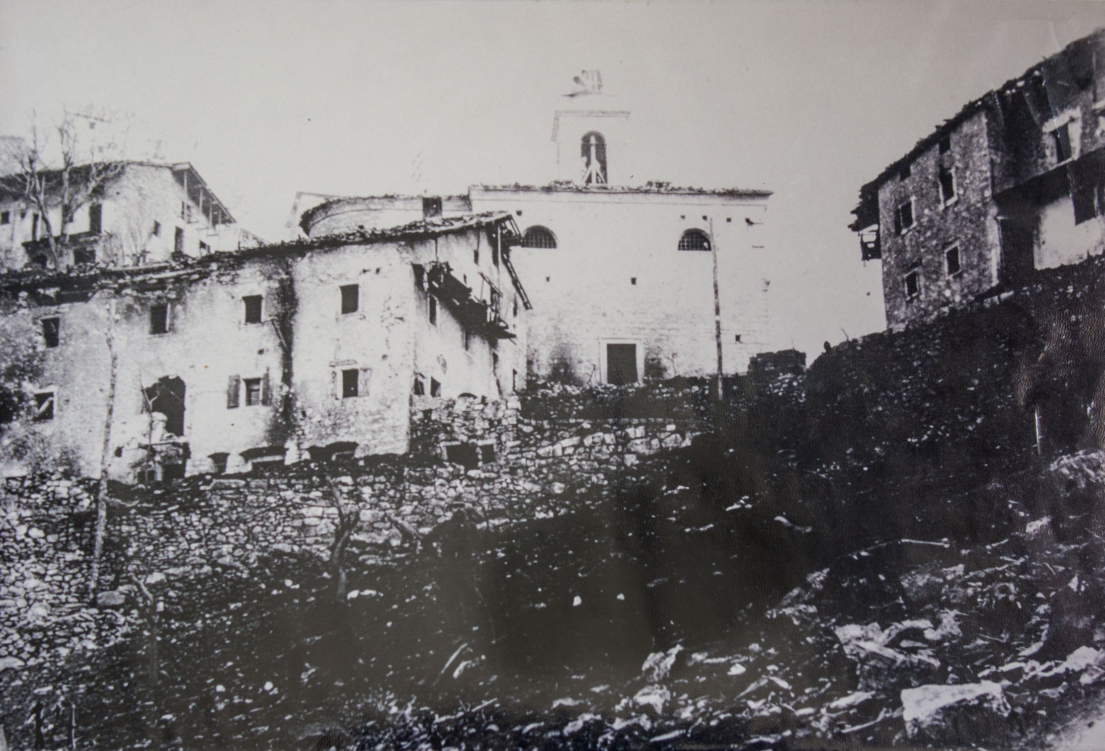 Crumbling houses in Incino after World War I
